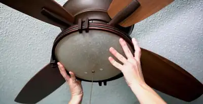 Ceiling fan repair and reinstallation on ceiling mount in Columbia, SC