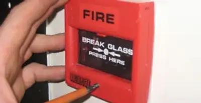 fire alarm installation service showing manual fire alarm pull station installed by licensed electricians in Columbia, SC