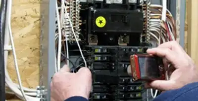 Home electrical inspection of circuit breaker panel by licensed electrician in Columbia, SC