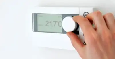Thermostat installation service with professional adjusting temperature control in Columbia, SC